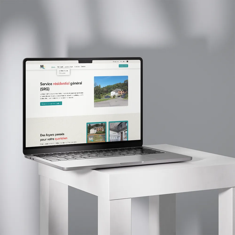 Simulation of the Vieux Moulin site on a light grey Macbook